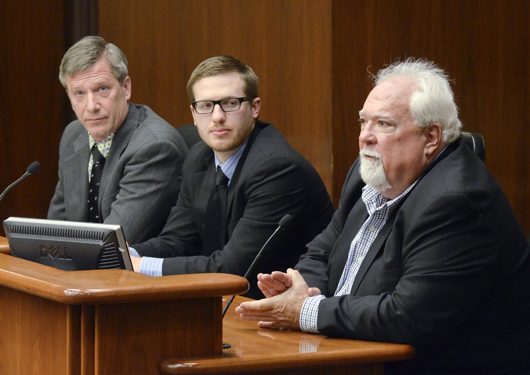 Ralph and Clifton Kaehler, from left, testify before the House Agriculture Finance Committee March 3 in support of a bill sponsored by Rep. Jack Considine Jr., right, that would fund Cuba agricultural marketing efforts. Photo by Andrew VonBank